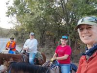 Equine-trail-crew-trimming-canopy-to-right-height-for-riders